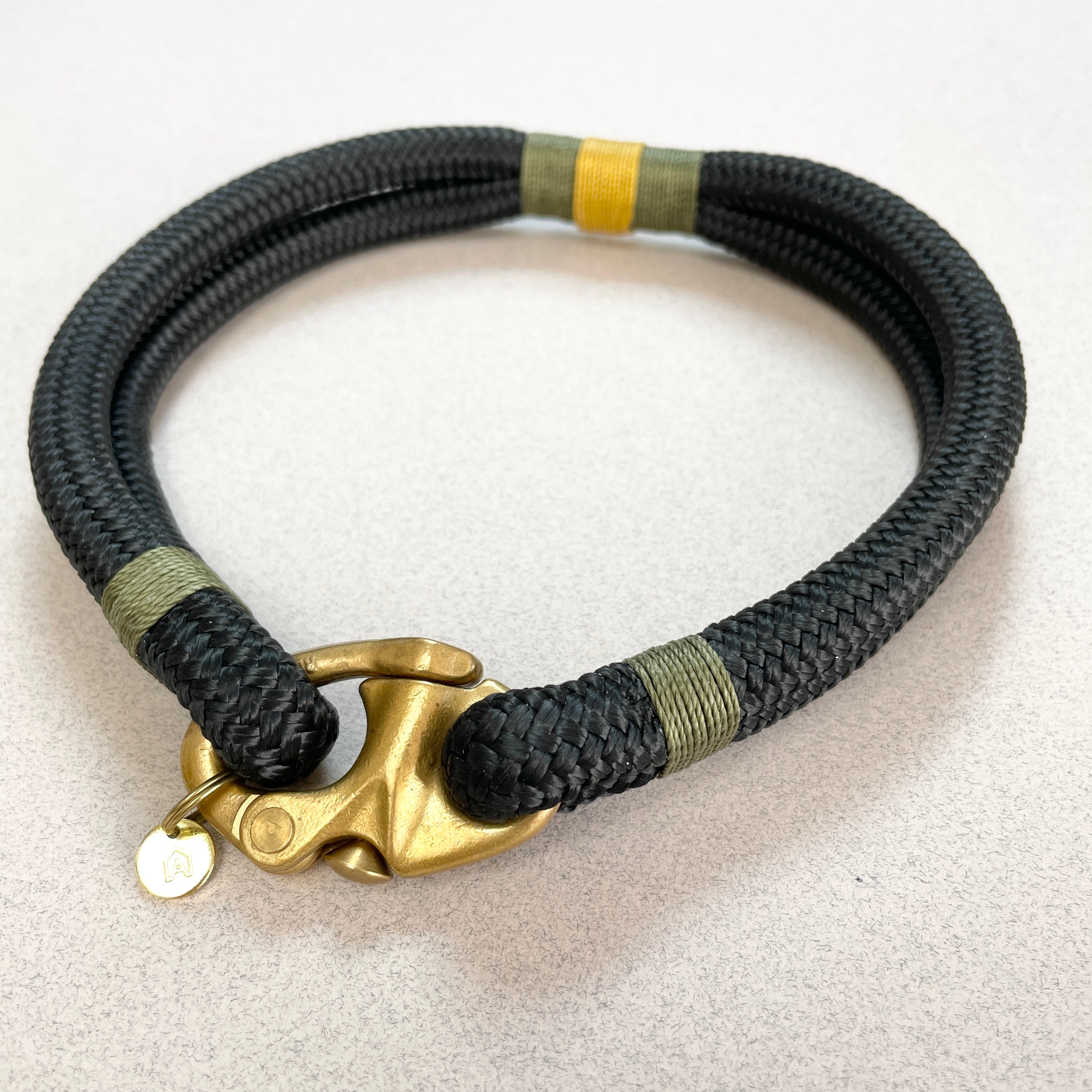 Close-up of Sandringham collar showing khaki green and mustard yellow whipping detail