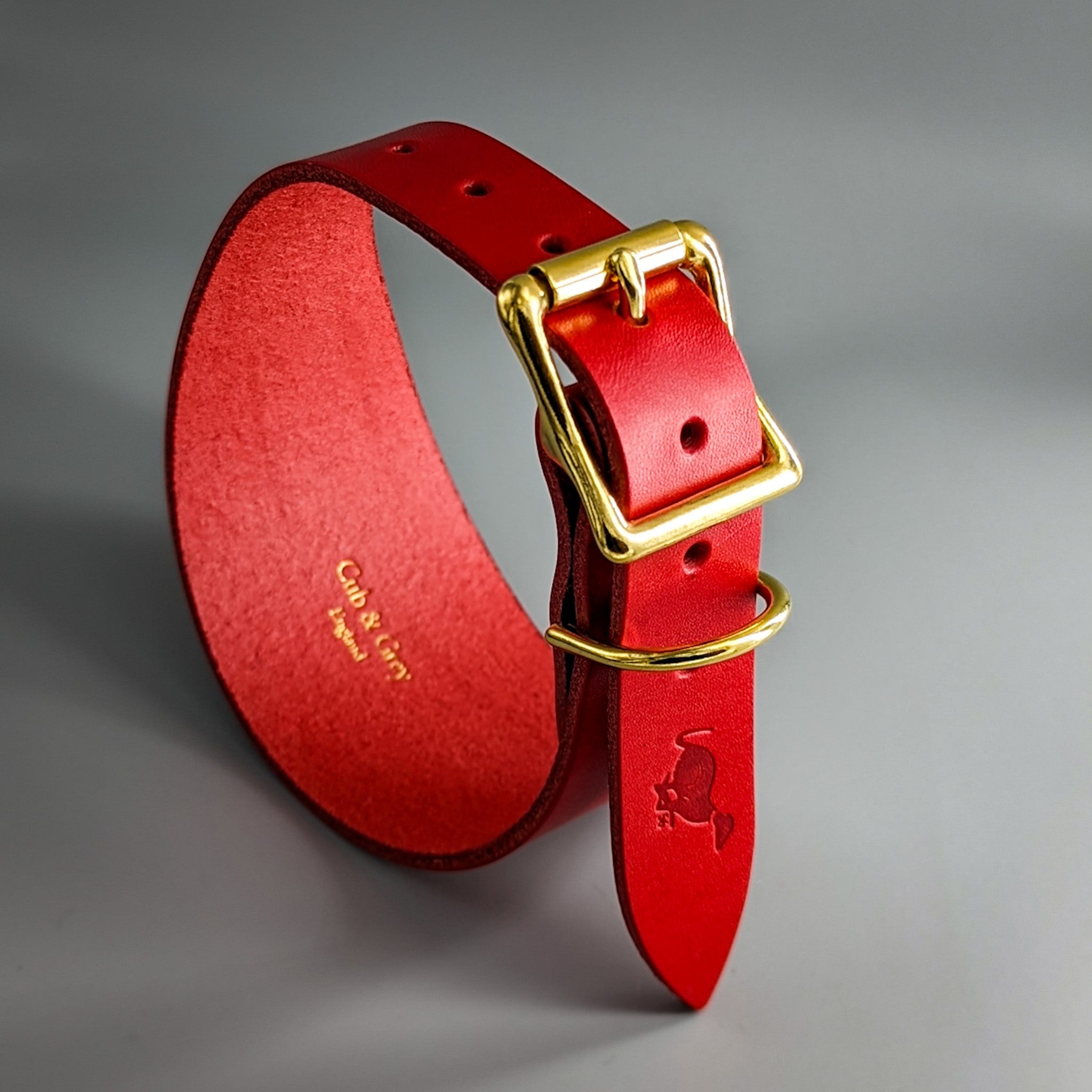 Red leather handcrafted whippet collar with gold-tone square buckle and embossed whippet silhouette design