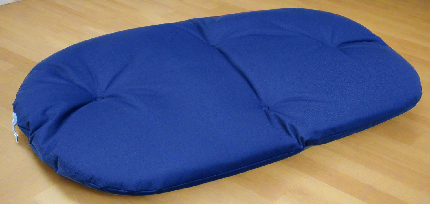 Blue waterproof oval dog bed cushion with quilted design on wooden floor - heavy duty P&L Country Dog bed