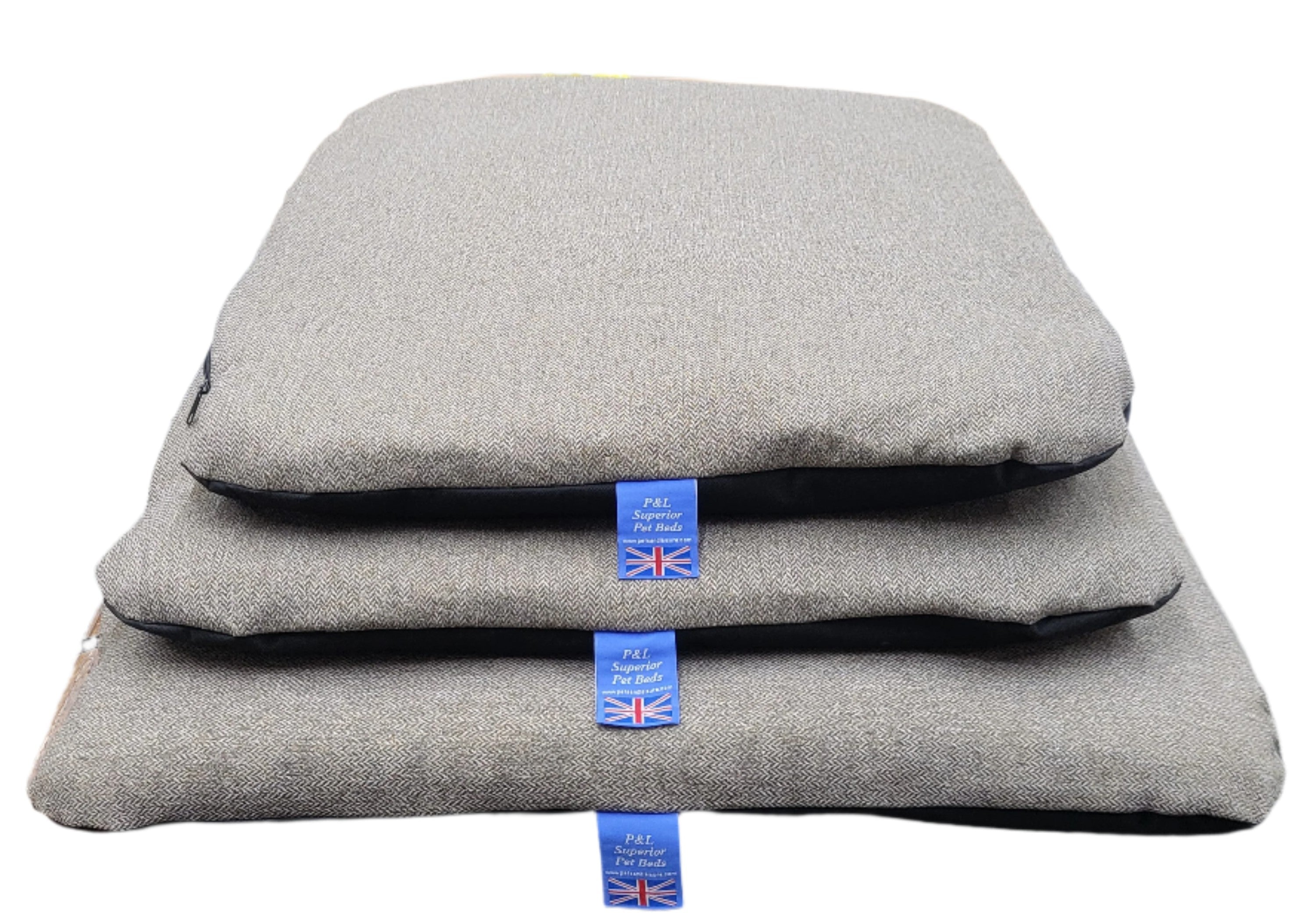 Stack of three grey Orkney tweed dog bed duvets with removable covers showing P&L Superior Pet Beds labels