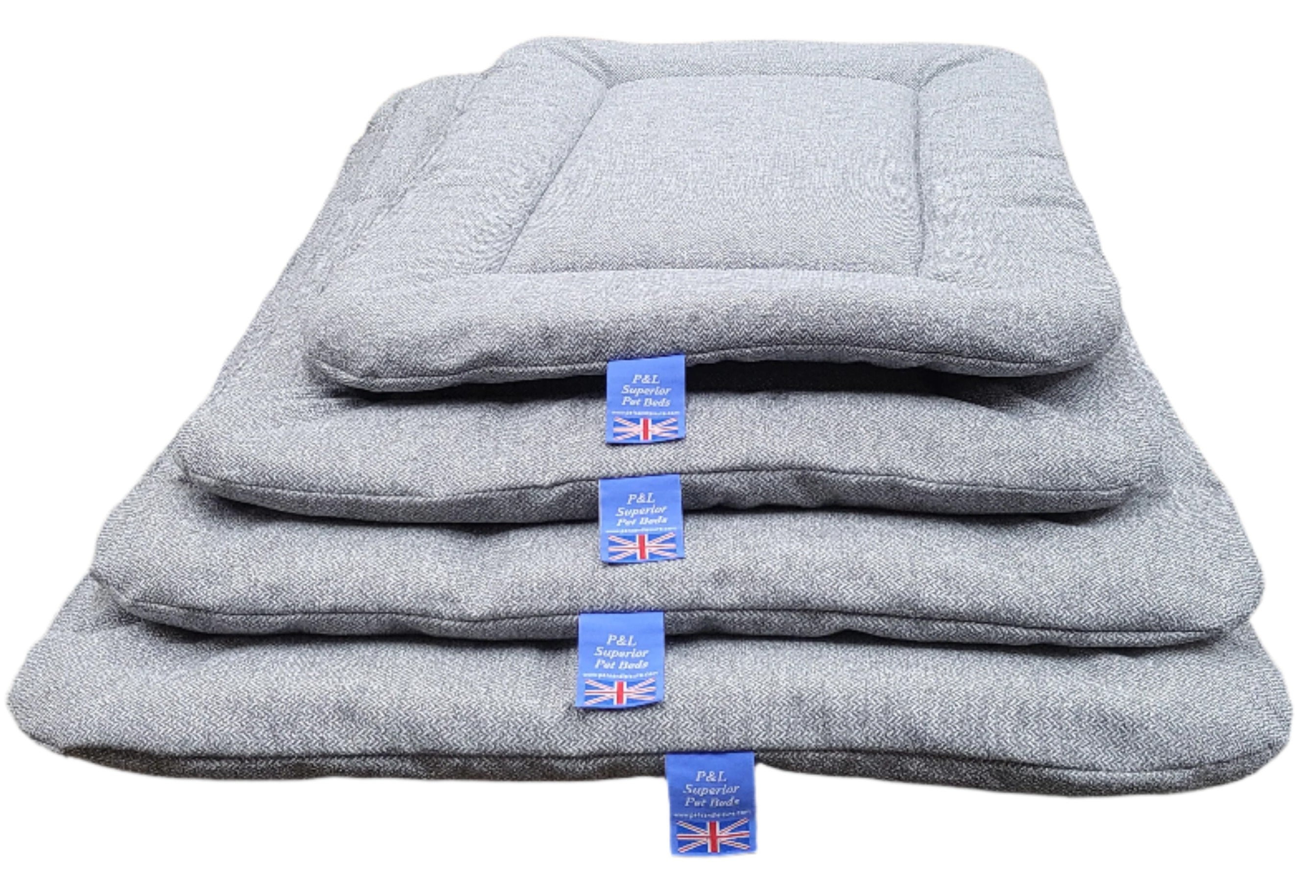 Grey Orkney tweed rectangular dog bed pads stacked showing P&L Superior Pet Bed blue labels with Union Jack flags