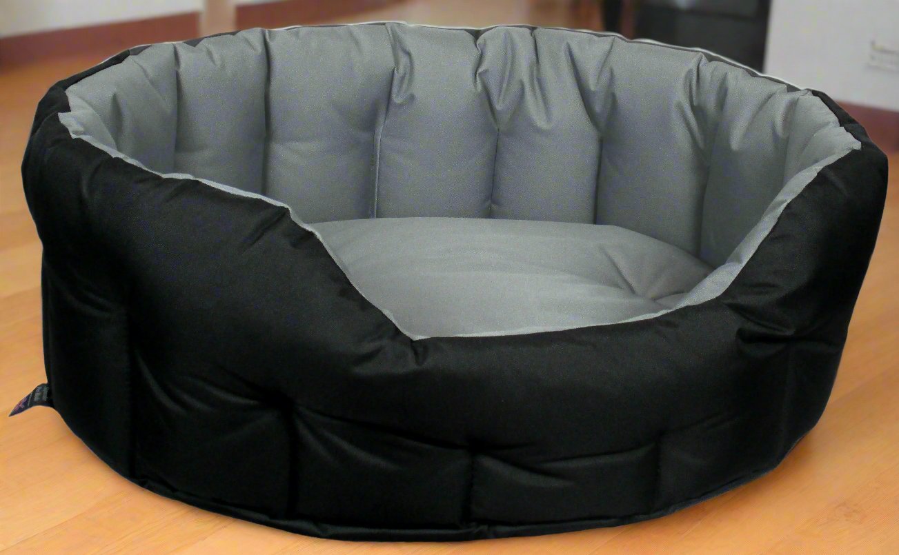 P&L Country Dog oval waterproof dog bed in black and grey, showing high sides and heavy duty construction