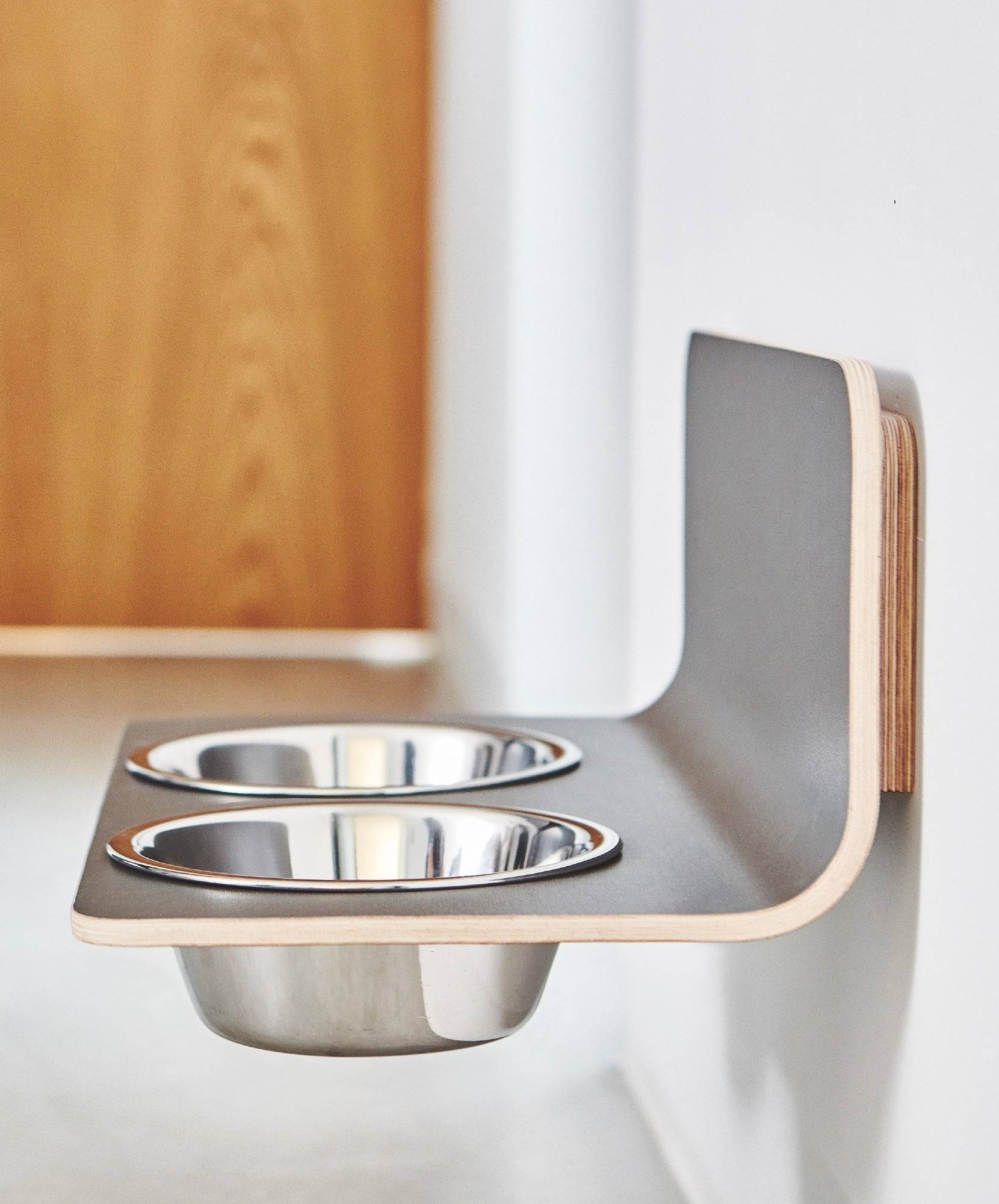 MiaCara Arco wall-mounted dog feeder with dual stainless steel bowls in minimalist German design for modern homes