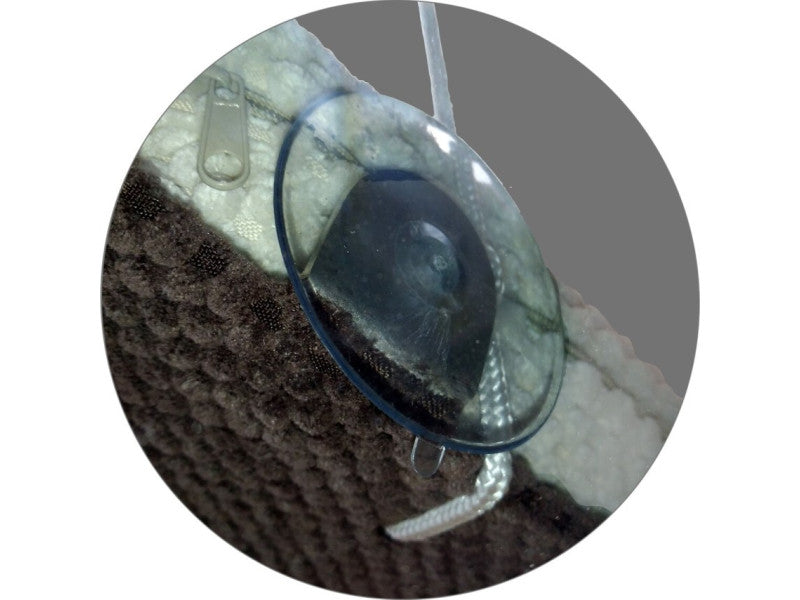 Close up of a suction cup and zip on The Sunny Spot Cat Window Perch