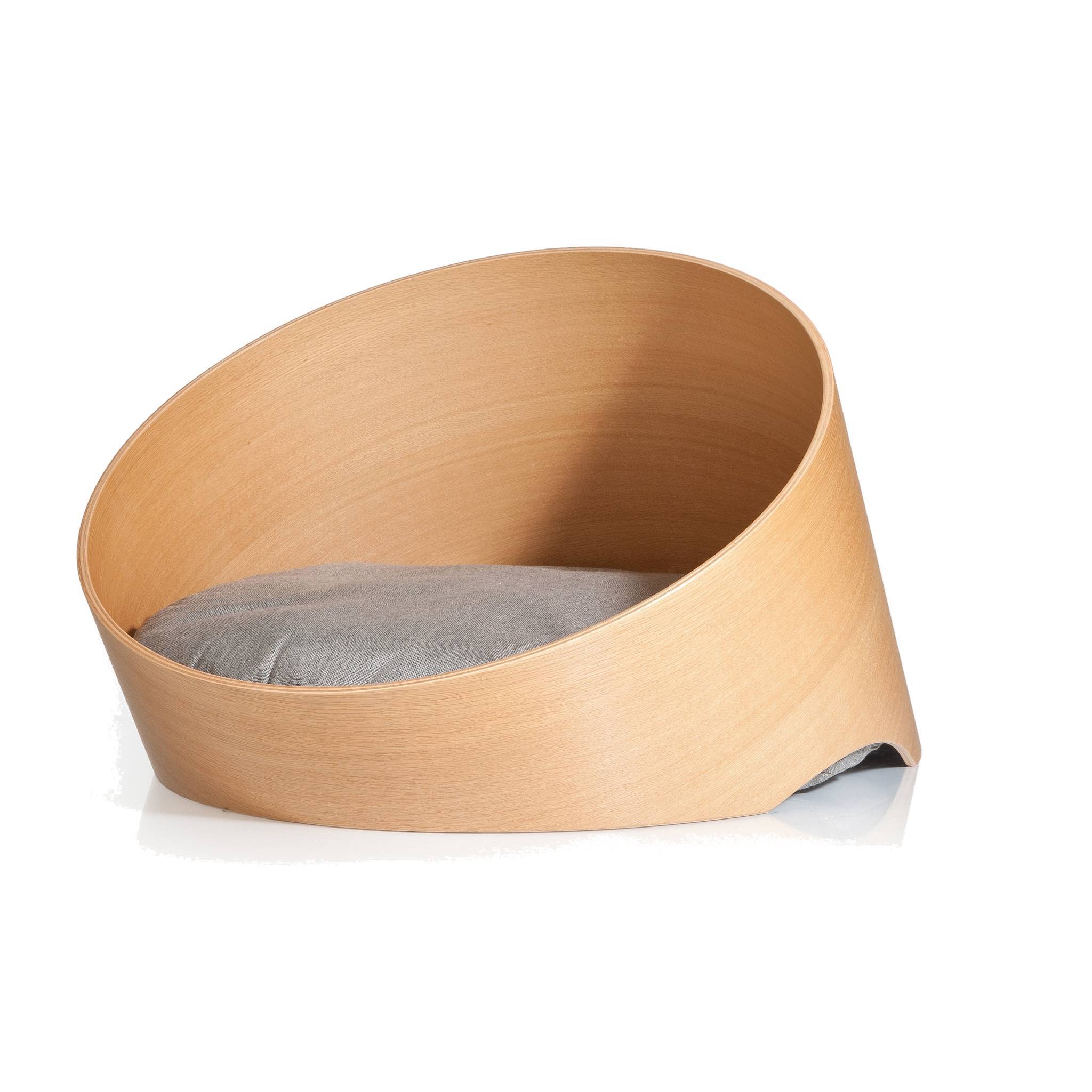 Modern wooden dog basket with minimalist design featuring curved bentwood construction and grey cushion pad