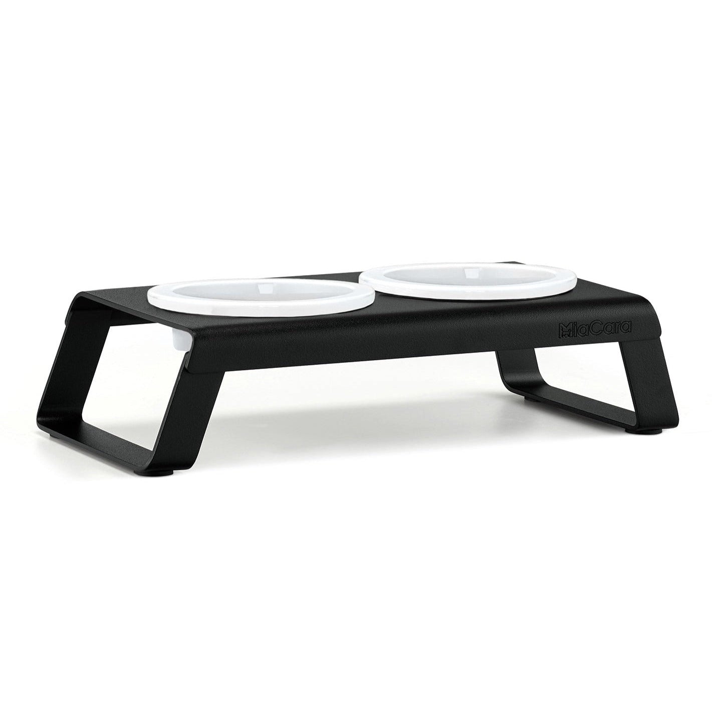 MiaCara Desco elevated cat feeder with dual white porcelain bowls on sleek black minimalist German design stand