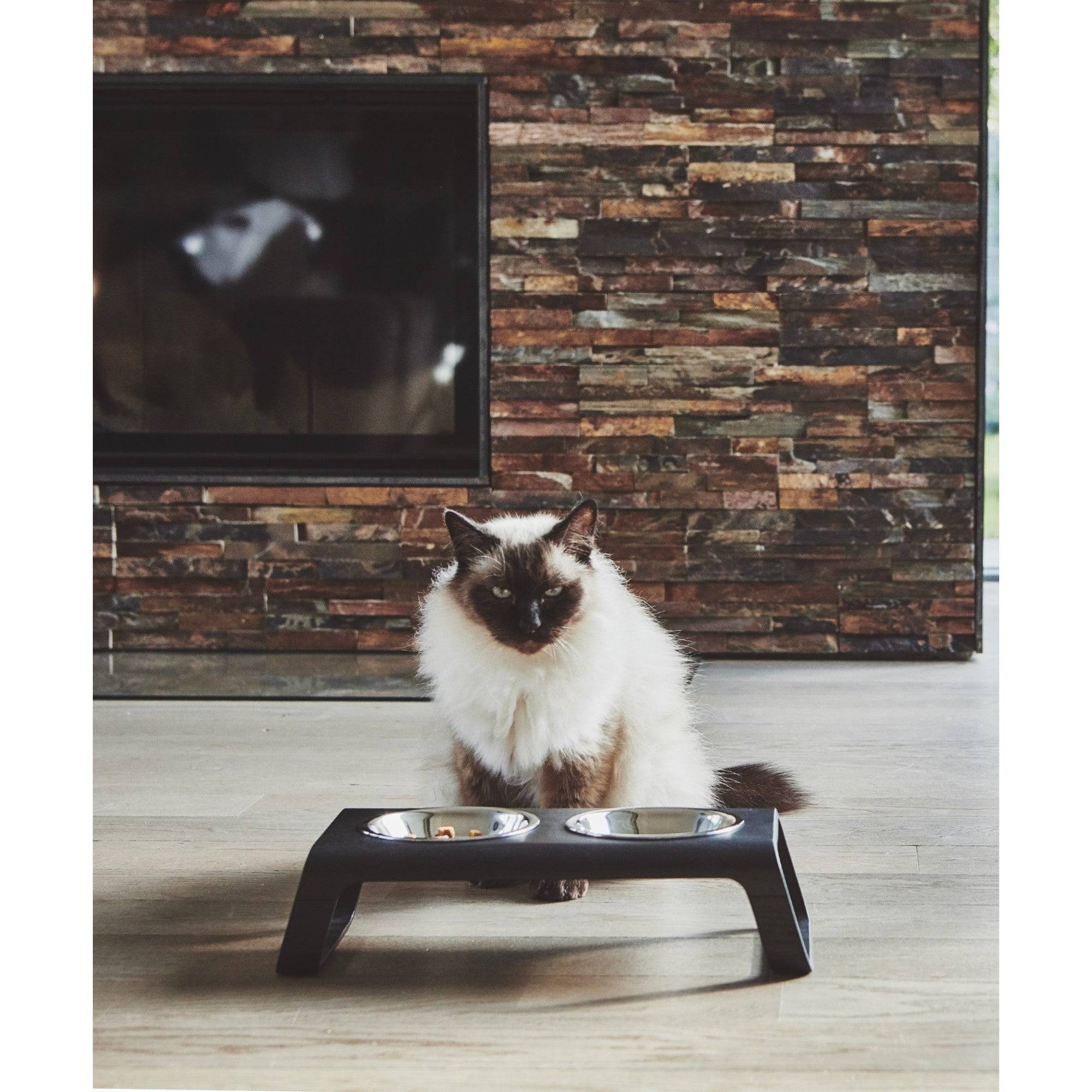 Detail view of MiaCara Desco elevated cat feeder showing German-designed steel bowl