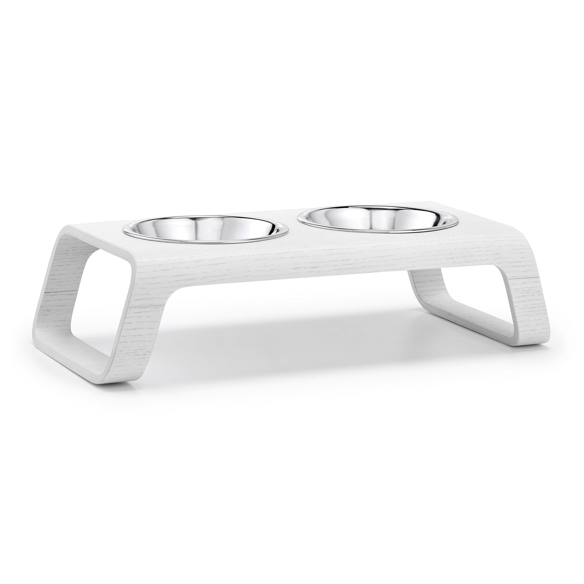 Modern white elevated cat feeder with dual stainless steel bowls, minimalist German design for contemporary homes