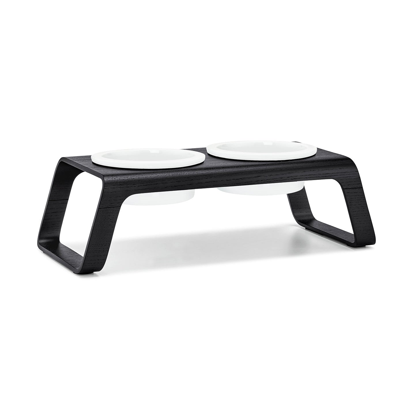 MiaCara Desco Elevated Dog Feeder in black ash with white bowls on a plain background