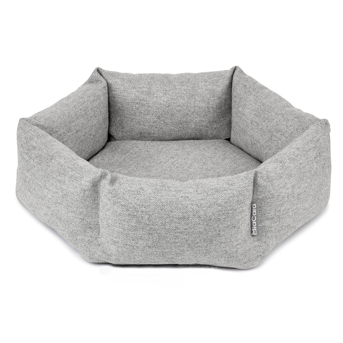 MiaCara Calma hexagon cat bed in Pebble, a light grey, with raised sides, on a white background