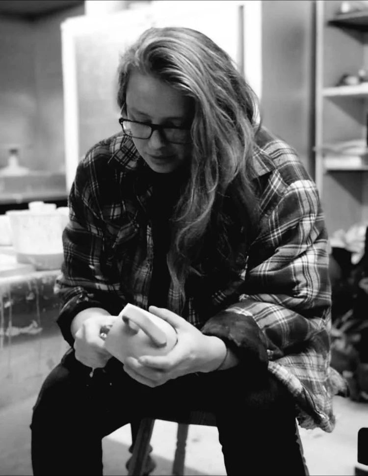 Artisan potter shaping ceramic pet bowl - traditional pottery techniques