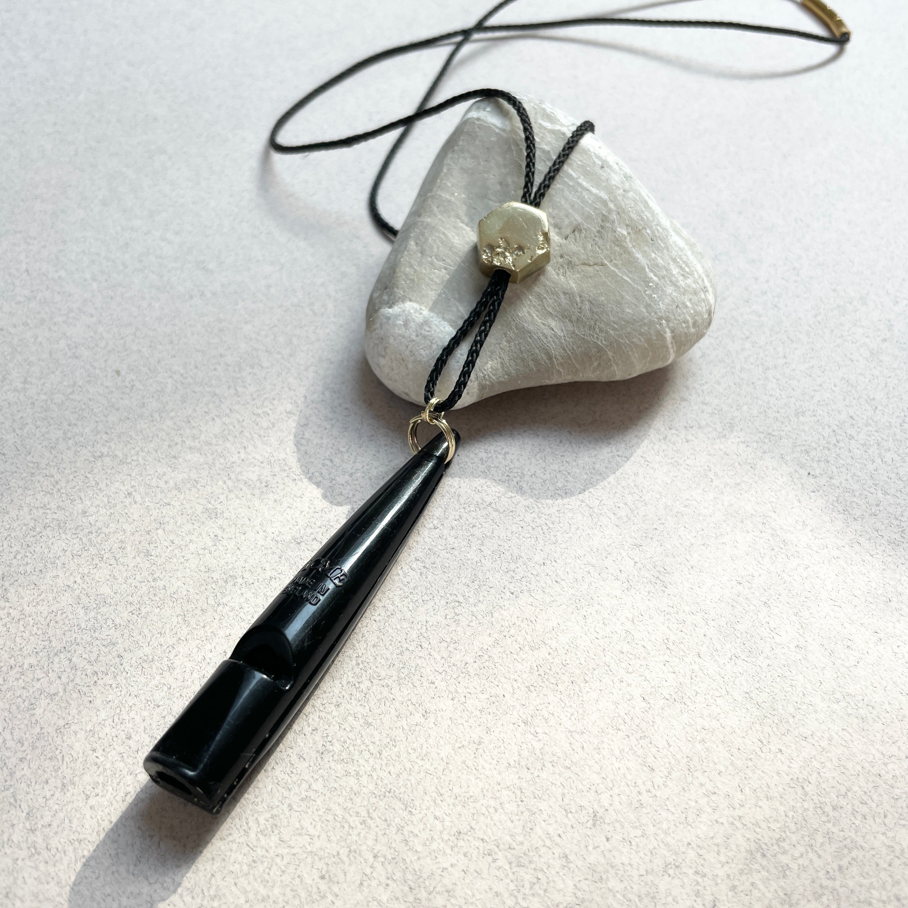Oonalfie Black and Gold whistle lanyard in marine-grade rope with solid brass hardware