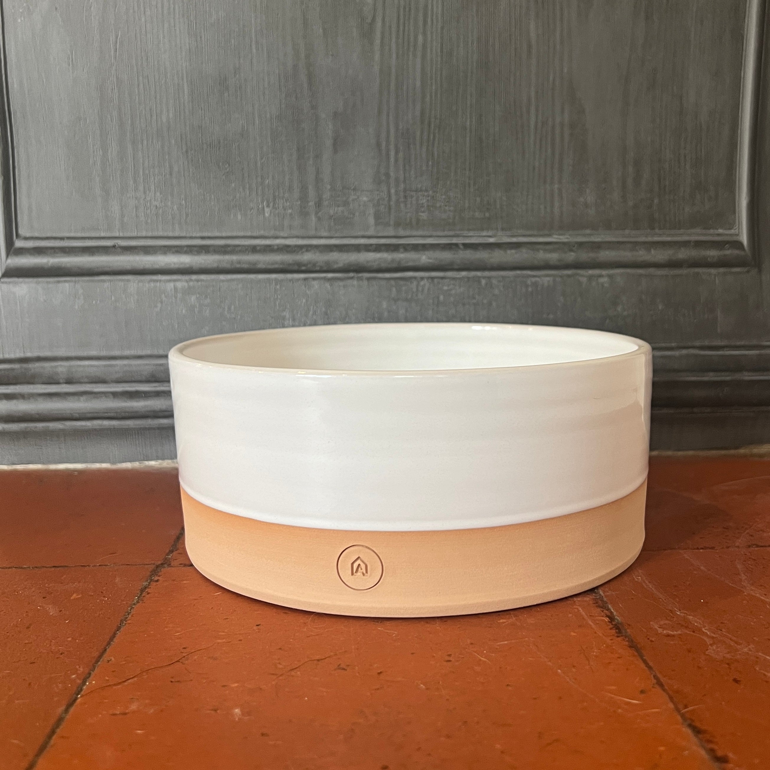 Oonalfie rose terracotta dog bowl showing food-safe glaze and handcrafted form, no two alike