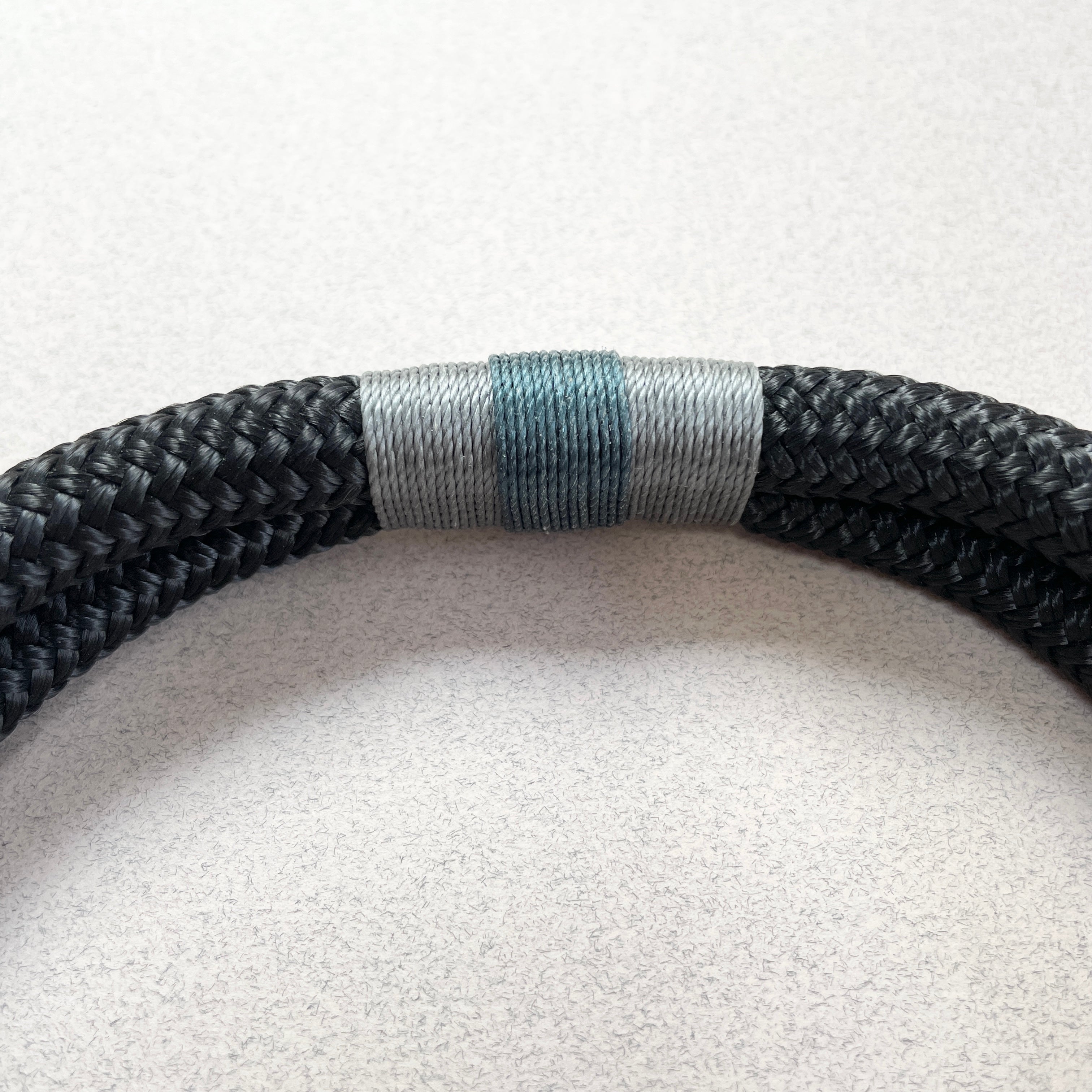 Northern Lights rope dog collar with aurora-inspired blue and teal thread detail