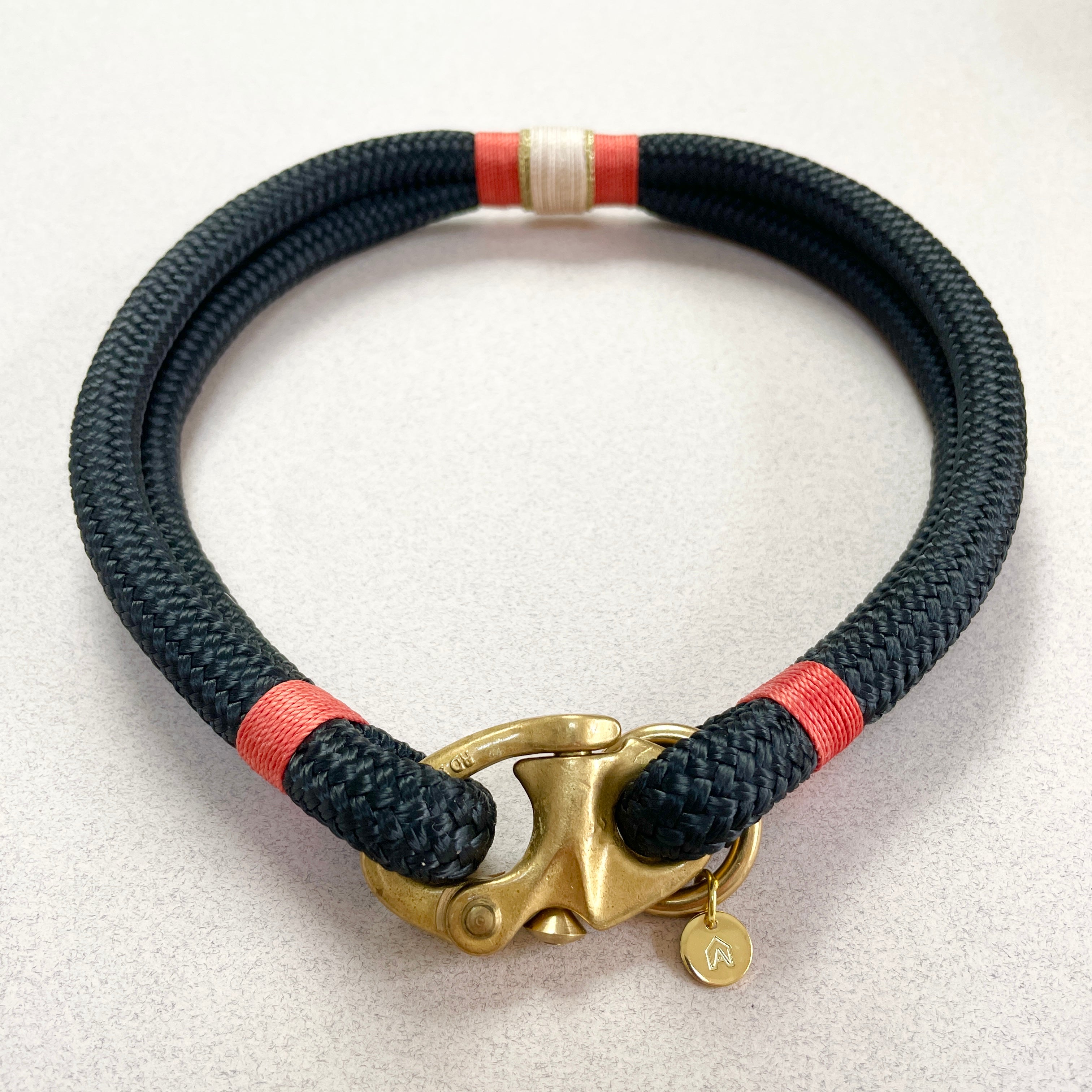 Oonalfie Himalayan rope dog collar in navy with coral red and white whipping detail and brass clasp