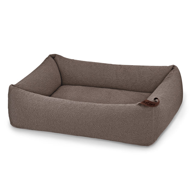 Modern taupe grey rectangular dog bed with raised sides and minimalist design featuring textured fabric upholstery