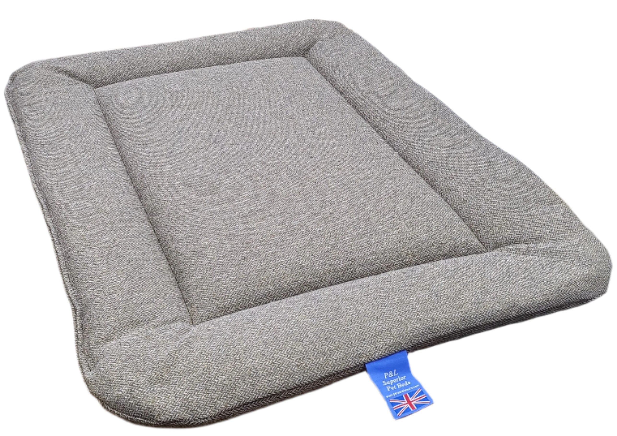Grey Orkney tweed rectangular dog bed pad with raised edges and Union Jack label showing superior UK craftsmanship