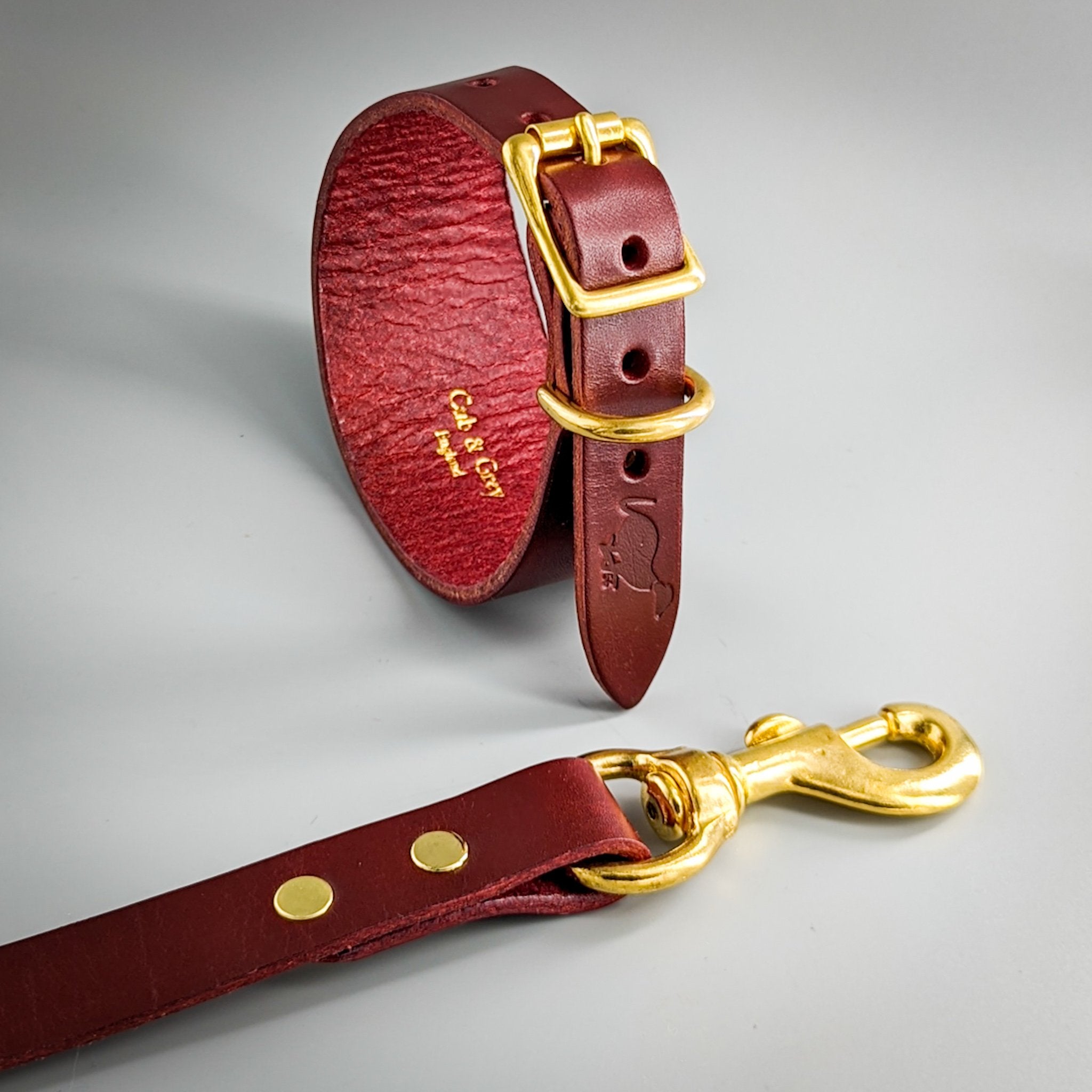 Burgundy leather luxury whippet collar lead set featuring gold embossed lettering and brass fittings