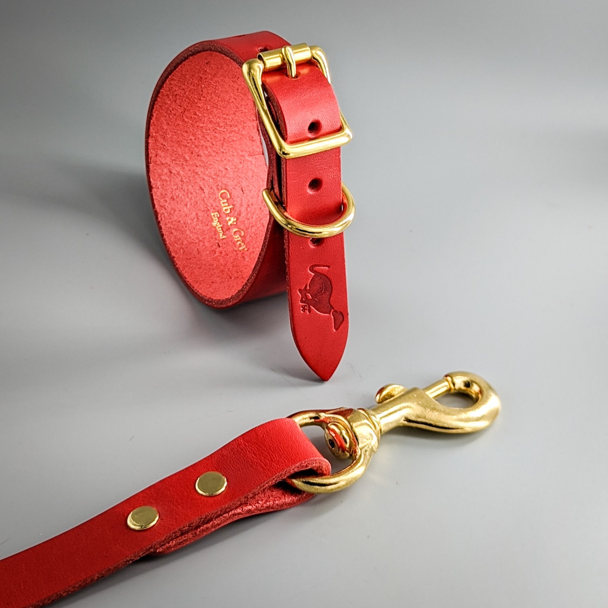 Handcrafted red leather whippet collar and matching lead set with gold-tone buckle and snap hook hardware
