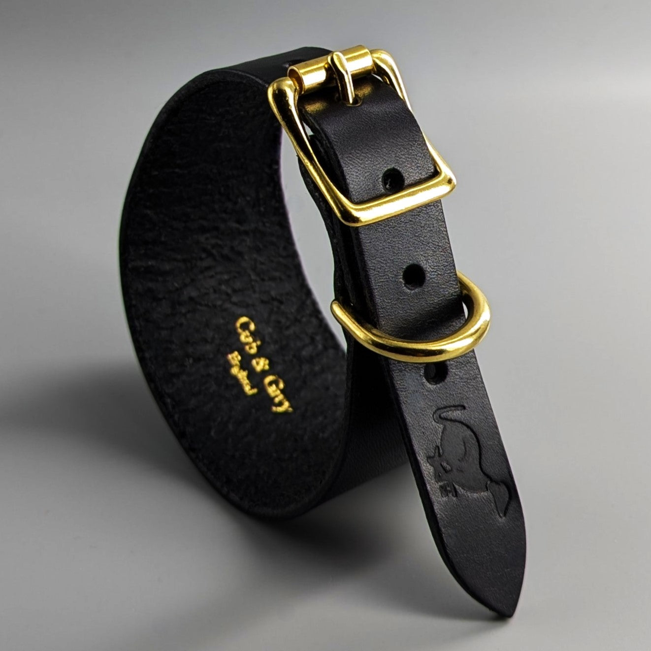 Detail view of handmade British Sedgwick leather hound collar with brass fittings