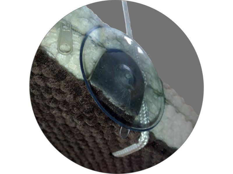 Close up of a suction cup attachment on the Cat's Atelier Cat Window Perch