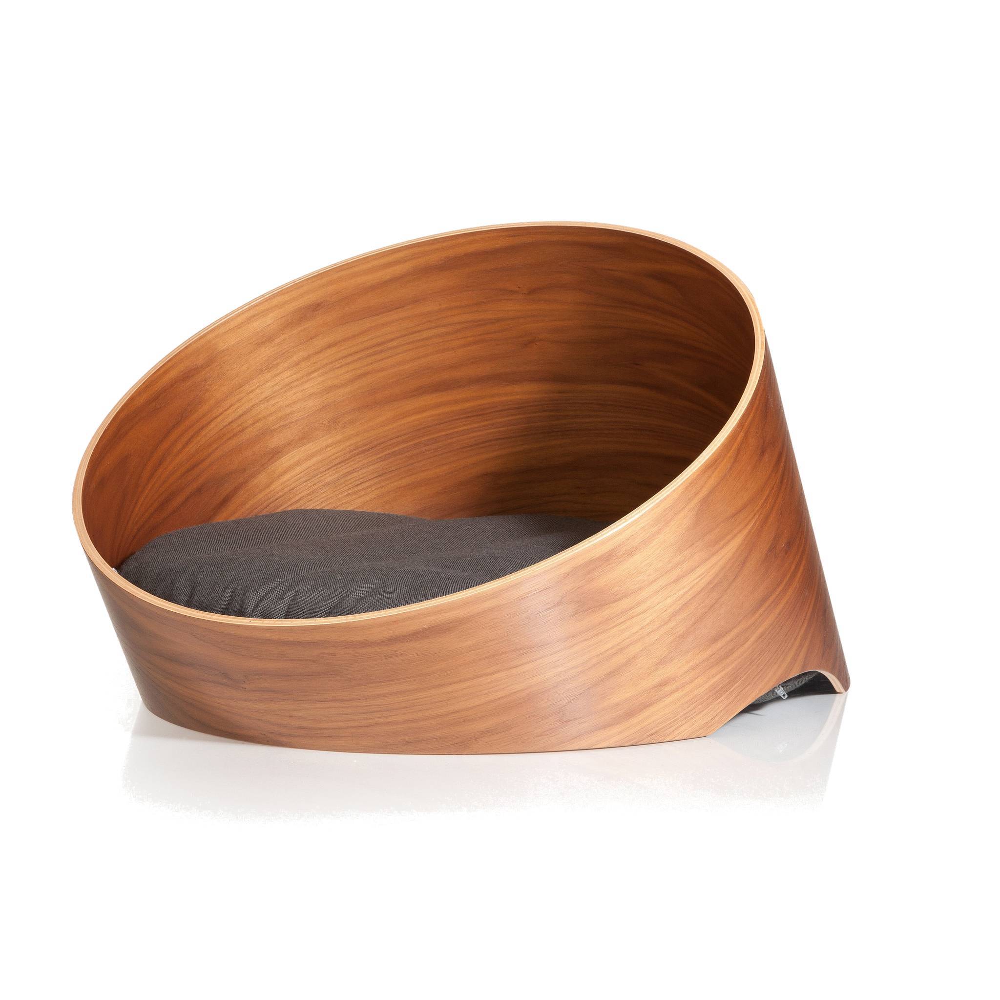 MiaCara Covo wooden dog basket with minimalist curved design and grey cushion showcasing German craftsmanship