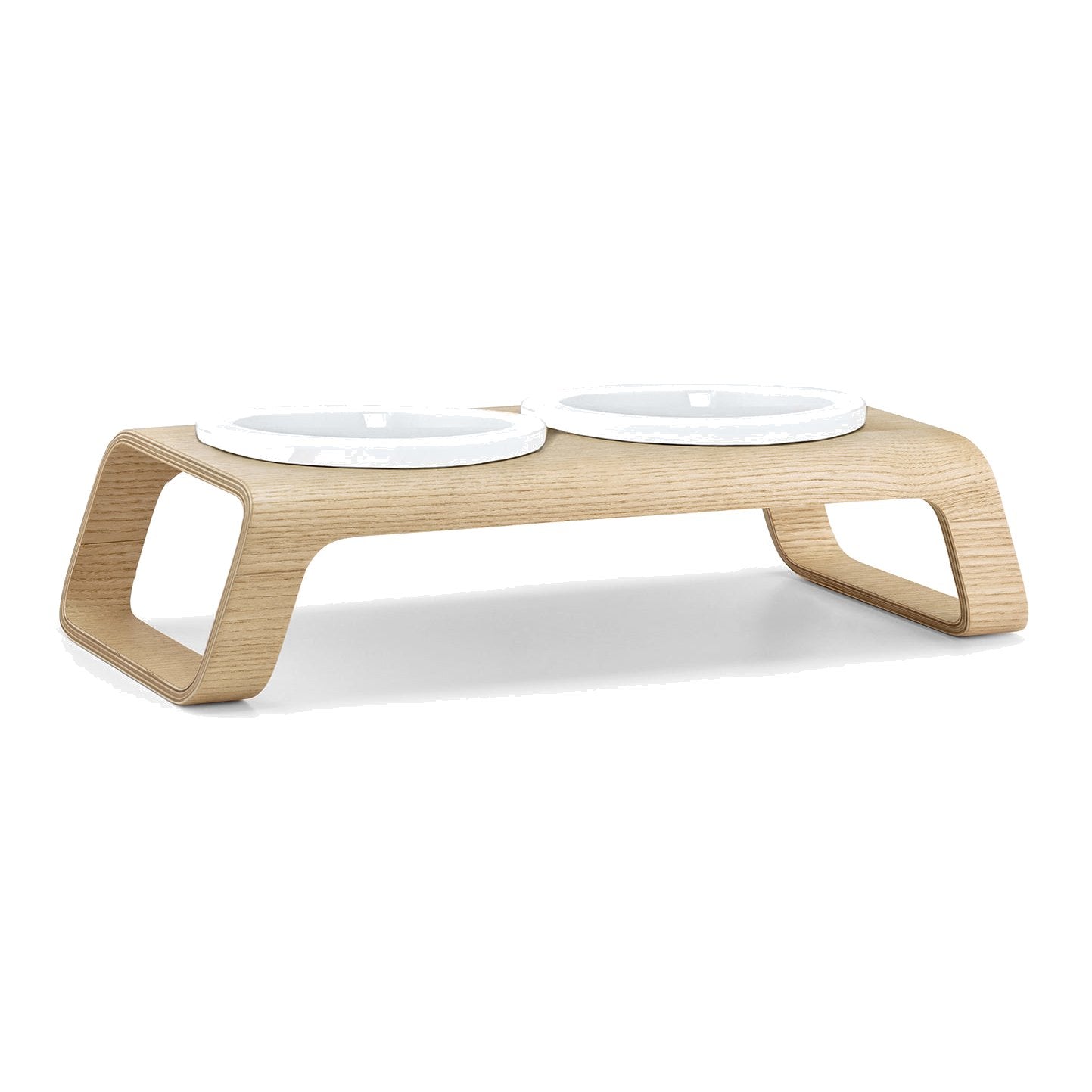 MiaCara Desco elevated cat feeder with curved oak wood stand and two white porcelain bowls on white background