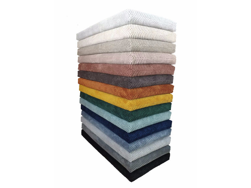 Stack of fabric samples in various colors for Extra Complete Mattress wood base shelves pet bedding options