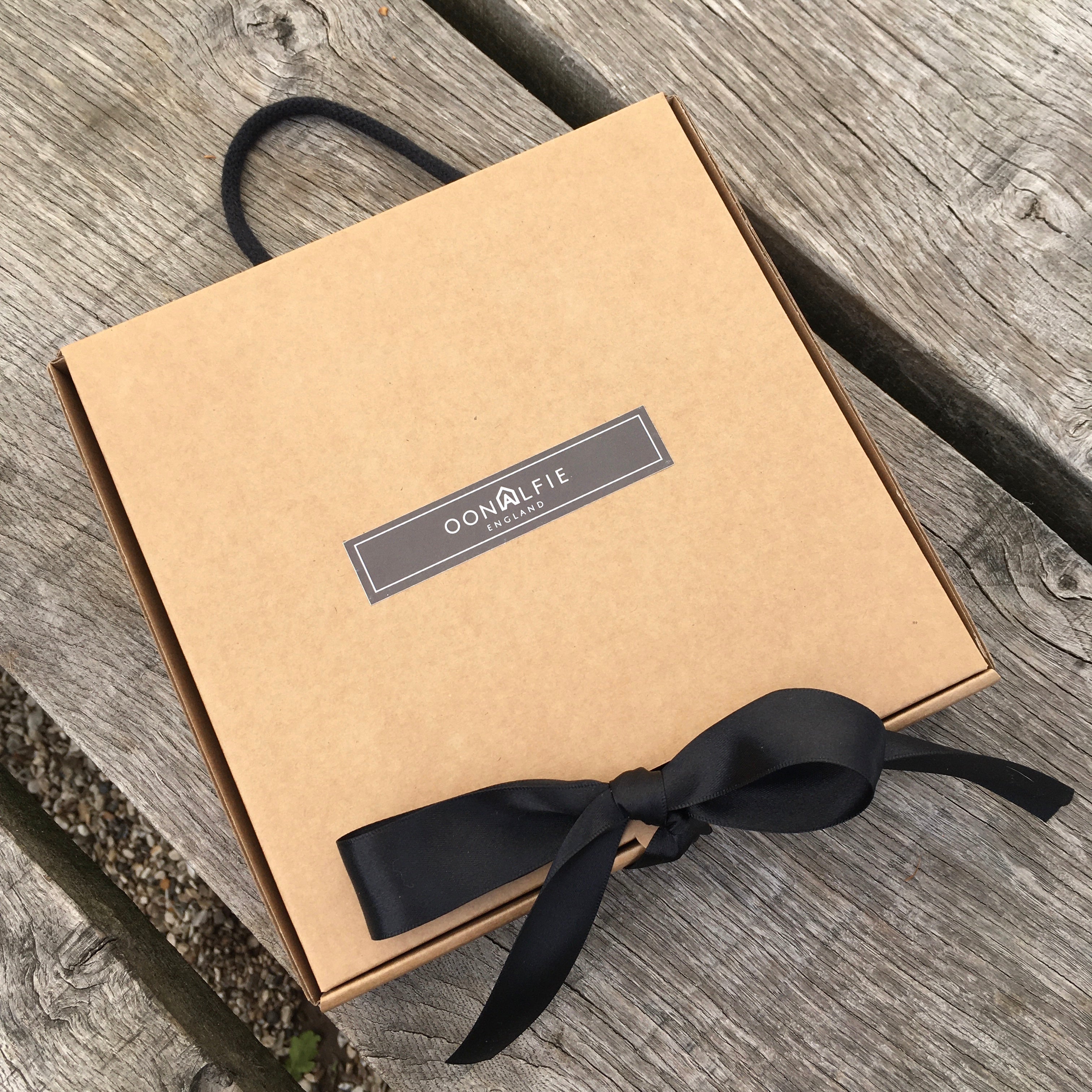 Oonalfie small collar in African Safari colourway on textured surface